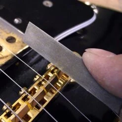 Gauged Nut Slotting File Set For Electric Guitar - StewMac 5 Gauged Nut Slotting File Set For Electric Guitar - StewMac -Luthier Tools Shop 0881 3 inuse saddle