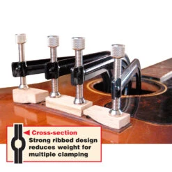 Soundhole Clamps - StewMac 5 Soundhole Clamps - StewMac -Luthier Tools Shop 2010 3 on guitar with inset caption